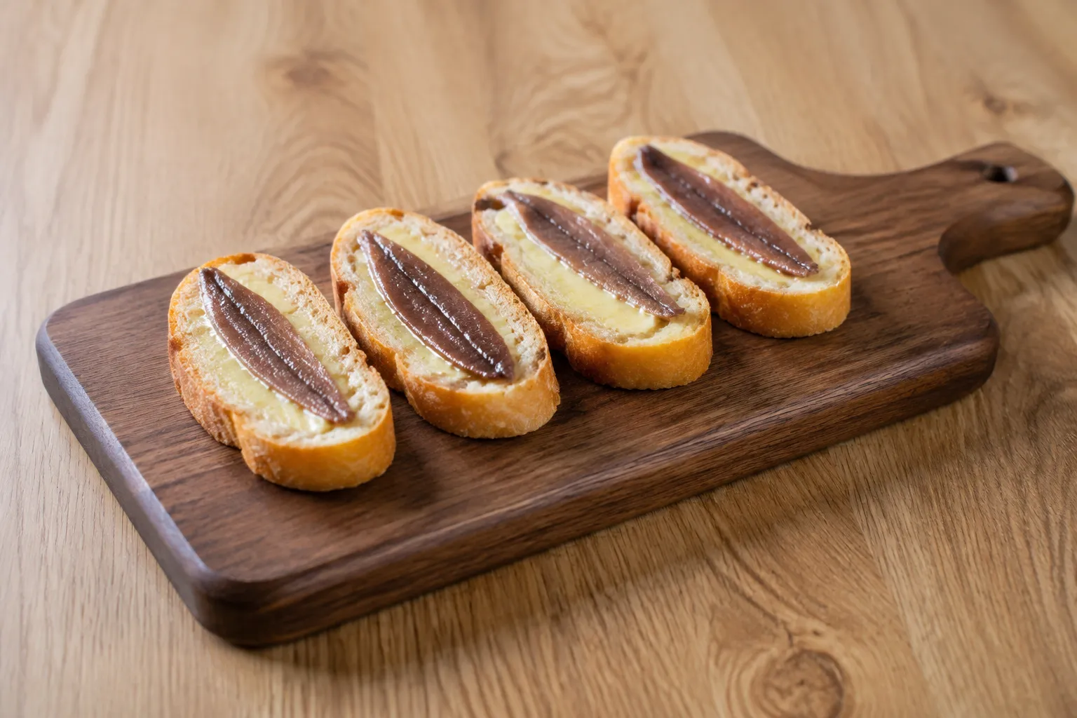 Imagen de la receta Anchoas sobre pan con mantequilla