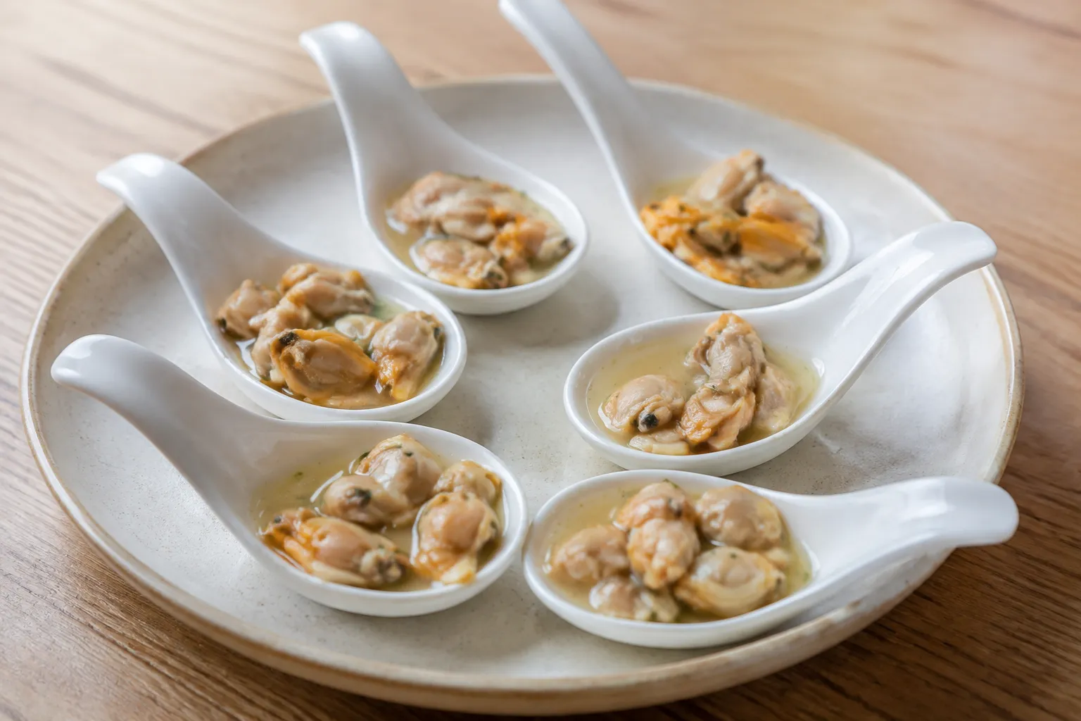 Imagen de la receta Cucharitas de berberechos con vinagreta de limón