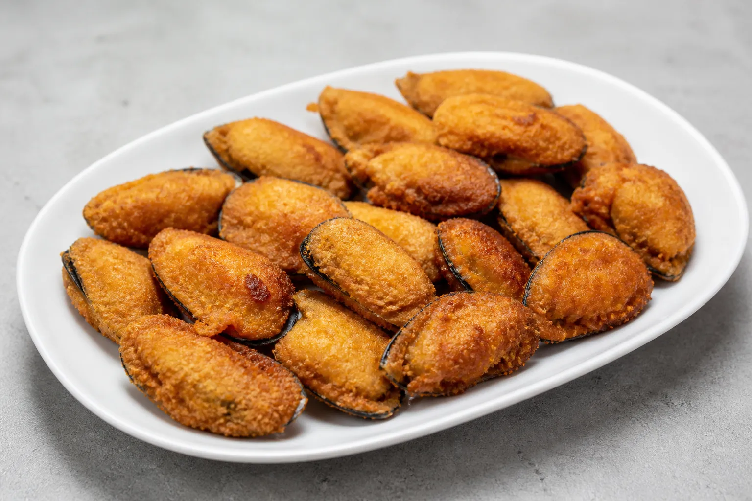 Mejillones rellenos rebozados